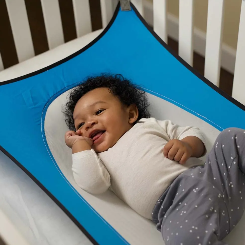 Crescent Womb™ The first + only Infant Safety Bed