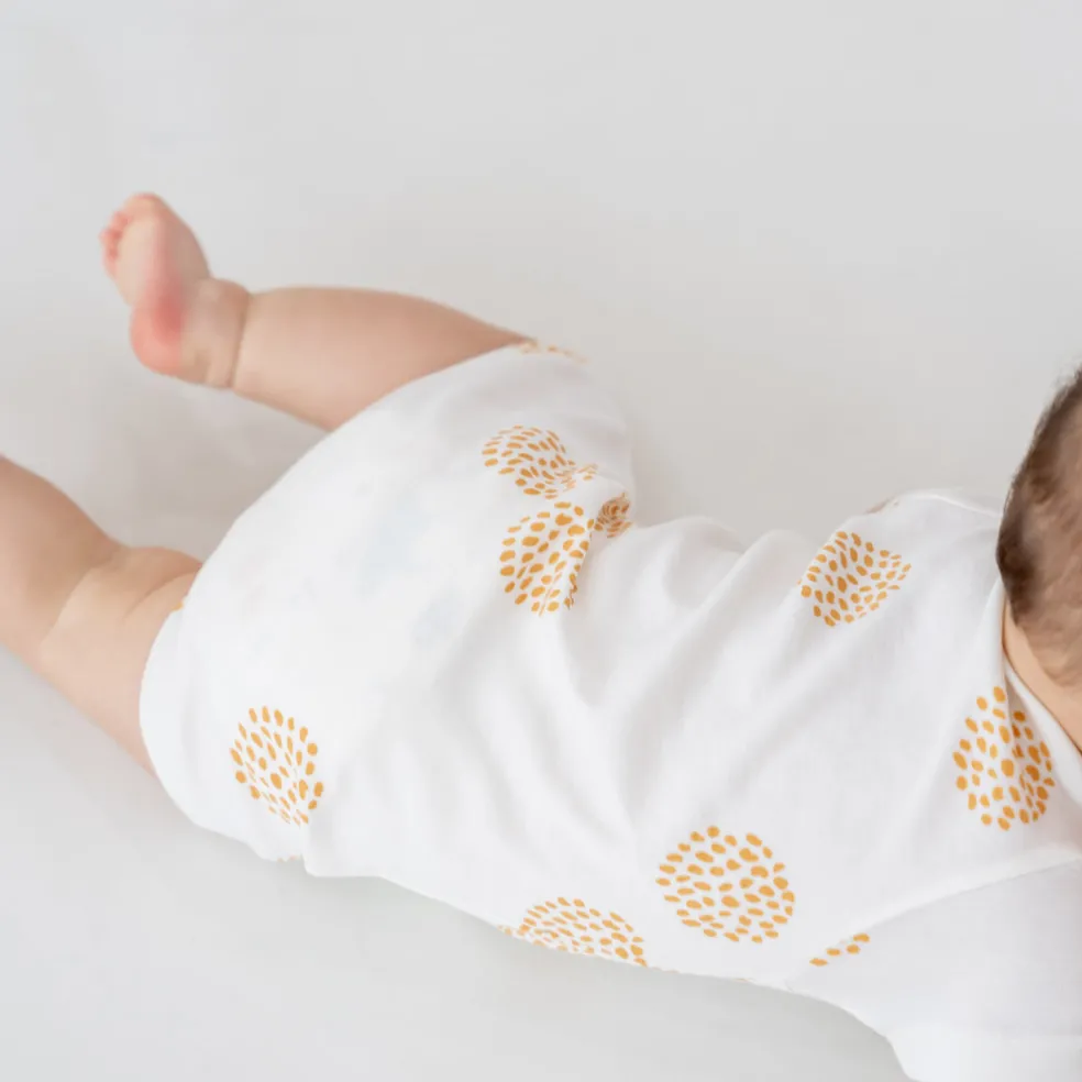 Motherswork x Le Petit Society Baby Organic Short Sleeve Romper in Dandelion Print