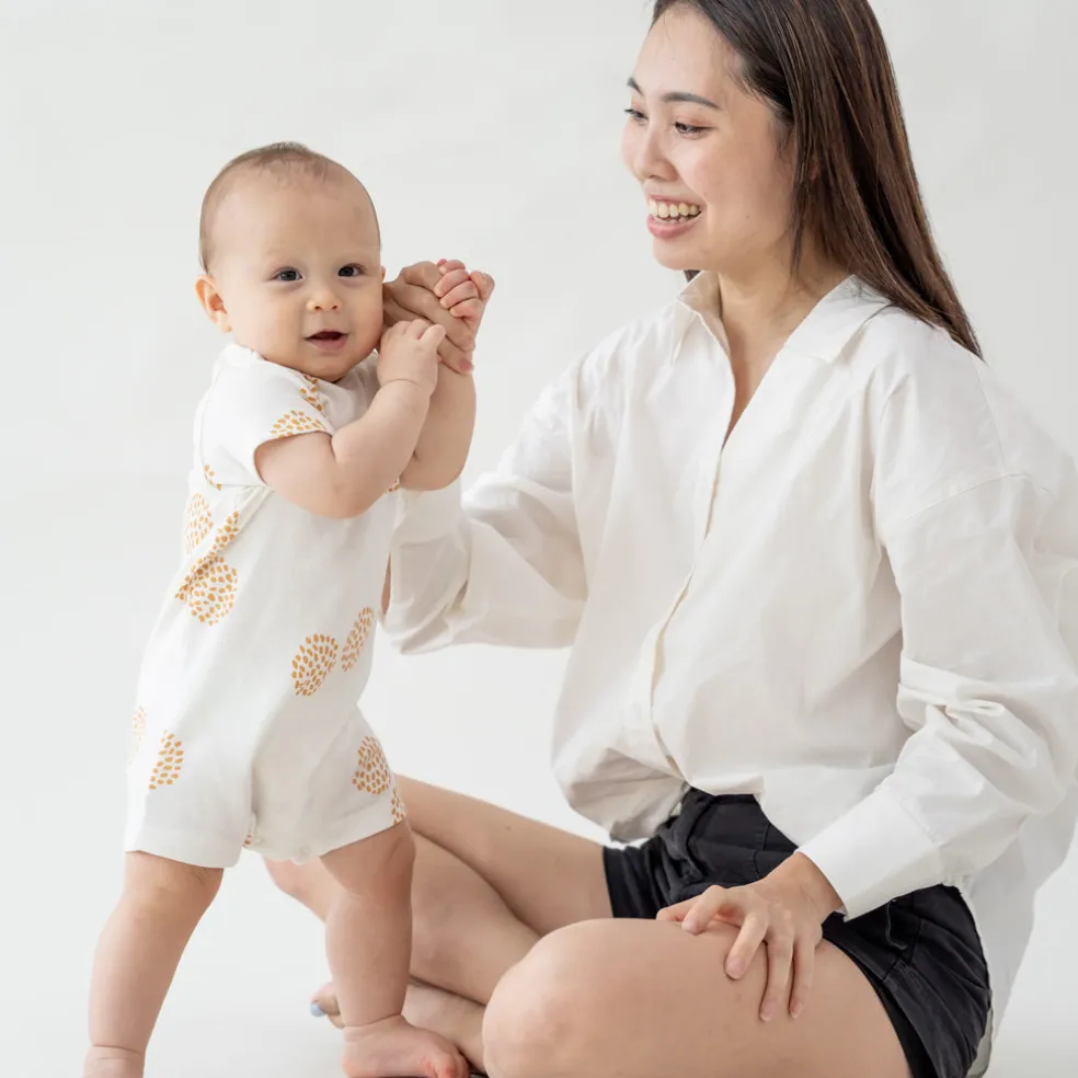 Motherswork x Le Petit Society Baby Organic Short Sleeve Romper in Dandelion Print